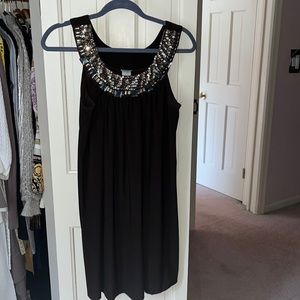 The cutest dress with sequin and rhinestone collar. BUY NOW won’t last